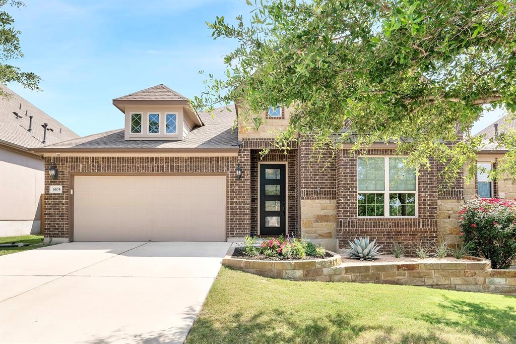 6105 Gunnison Turn Road Austin, TX 78738 - Photo 1 of 1 front view of house with a yard