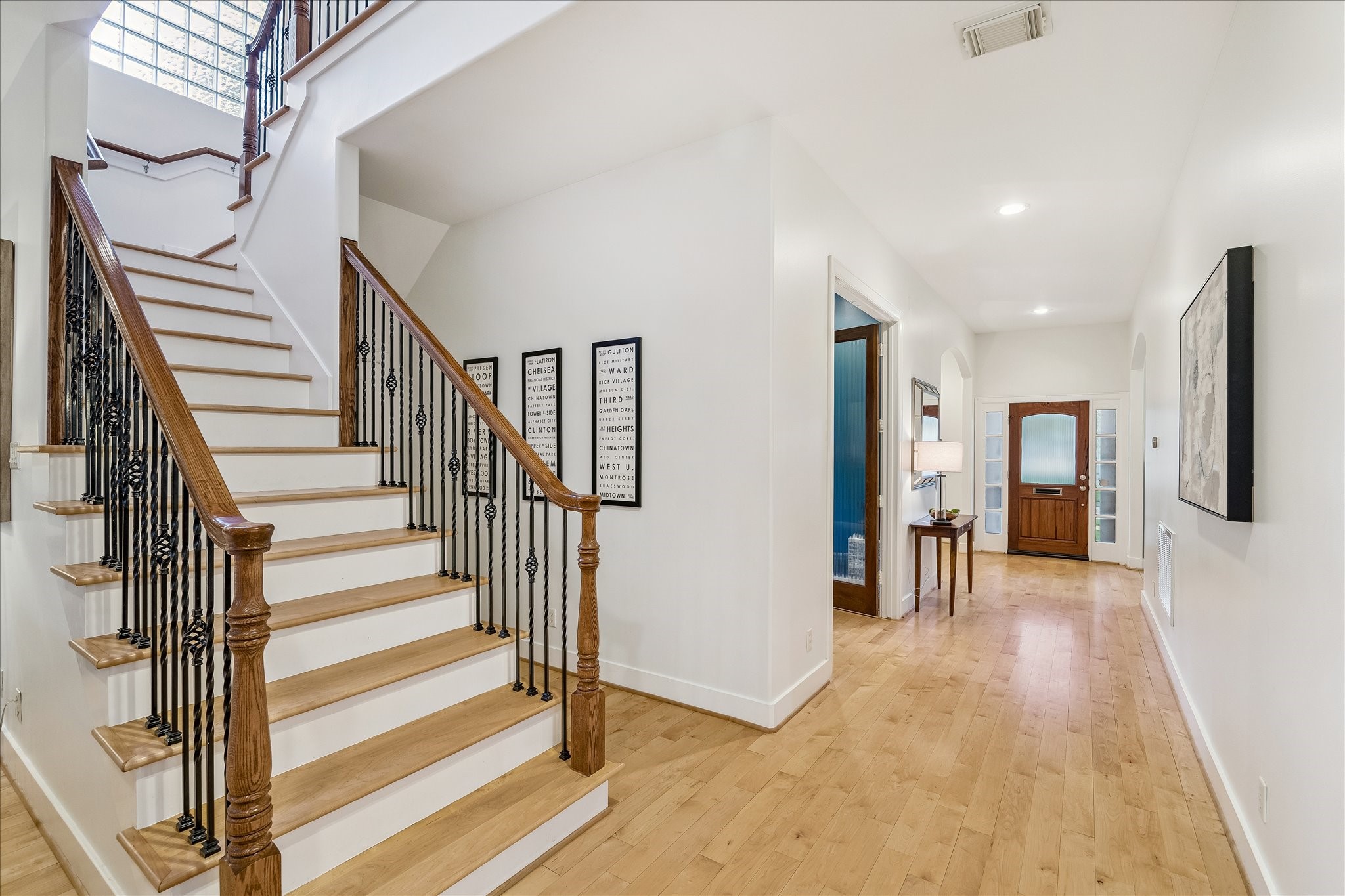 4010 Milton Street Houston, TX 77005 - Photo 18 of 49 FIRST FLOOR HALLWAY. Note how wide the hallway is - the generous dimensions of the home is a feature throughout. Note the white oak hardwoods throughout the first floor and continue up to the second floor.