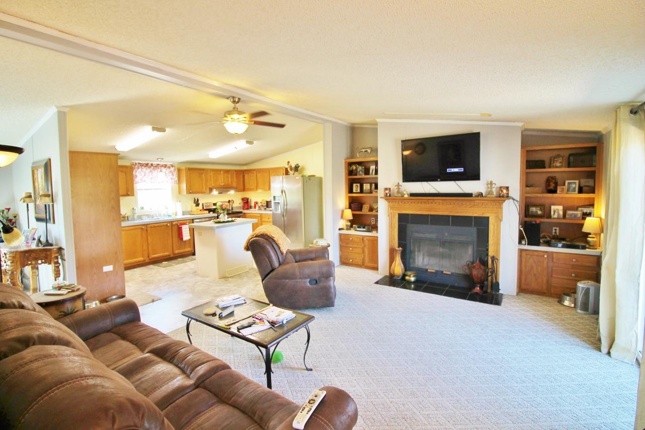 1119 Maple Hill Road Lebanon, TN 37087 - Photo 13 of 30 a living room with furniture and a fireplace