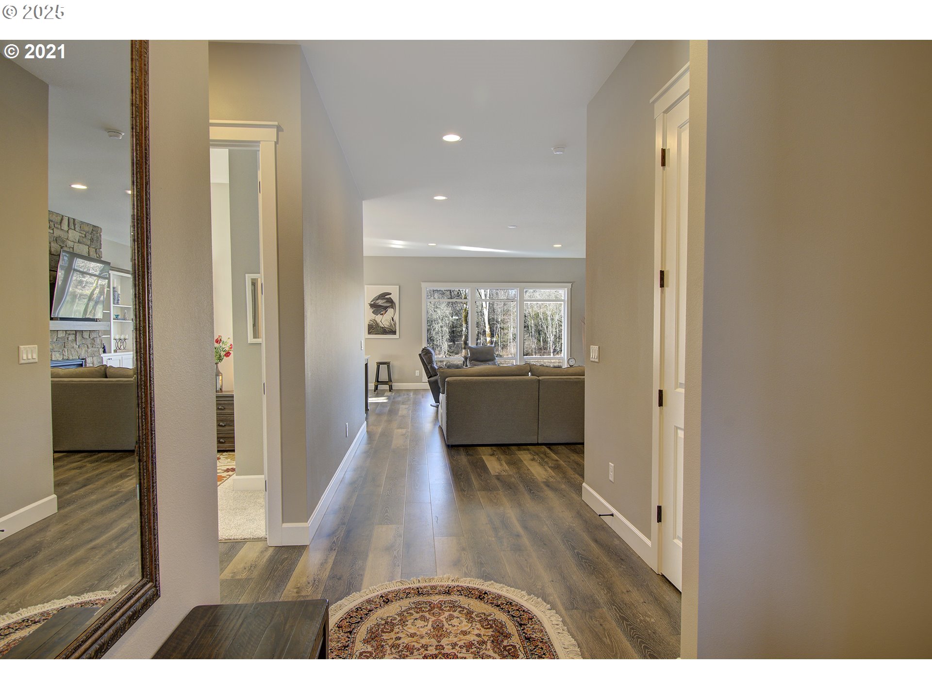 15116 Northeast Grantham Road Amboy, WA 98601 - Photo 2 of 9 a open hall with wooden floor and a bathroom