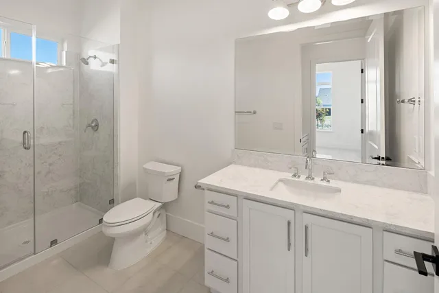 a bathroom with a sink and cabinets