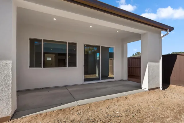 a view of backyard of the house