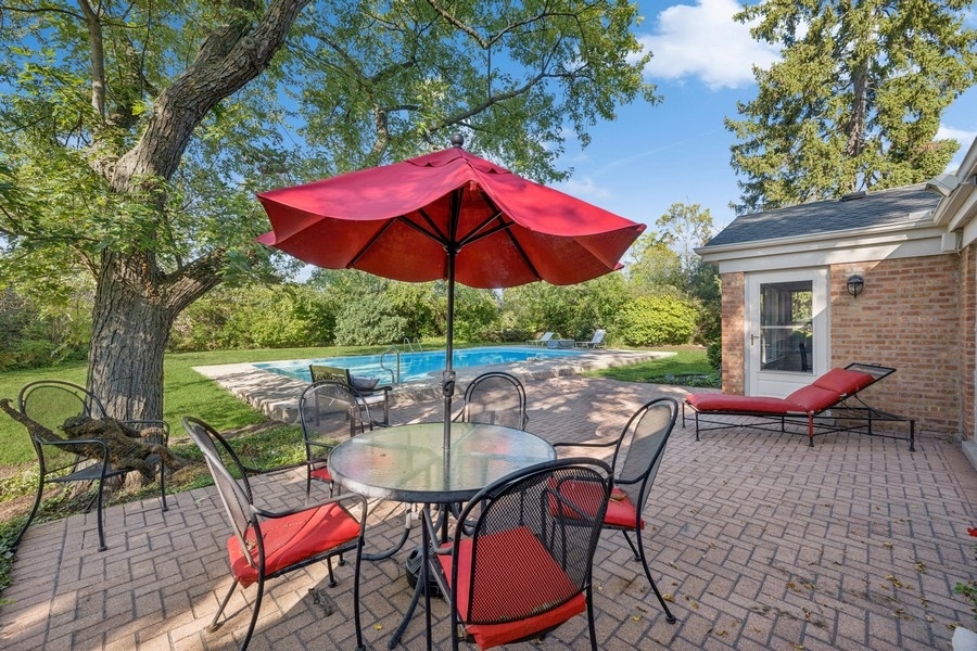 334 7 Pines Circle Highland Park, IL 60035 - Photo 19 of 19 a view of backyard with seating space and wooden floor