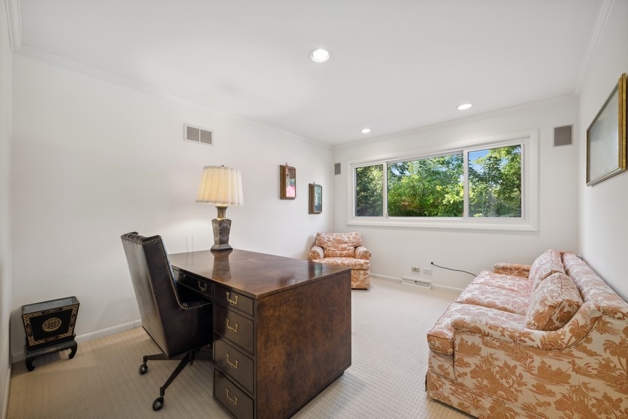 334 7 Pines Circle Highland Park, IL 60035 - Photo 10 of 19 a living room with furniture and a window