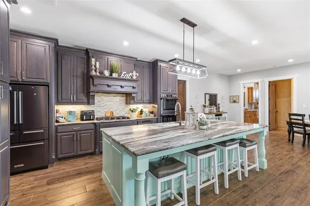 a room with furniture and a wooden floor