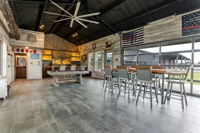 an aerial view of house with yard