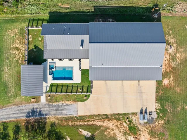 a view of a swimming pool with an ocean view