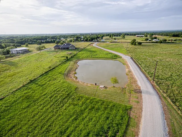 a view of a swimming pool and a lake