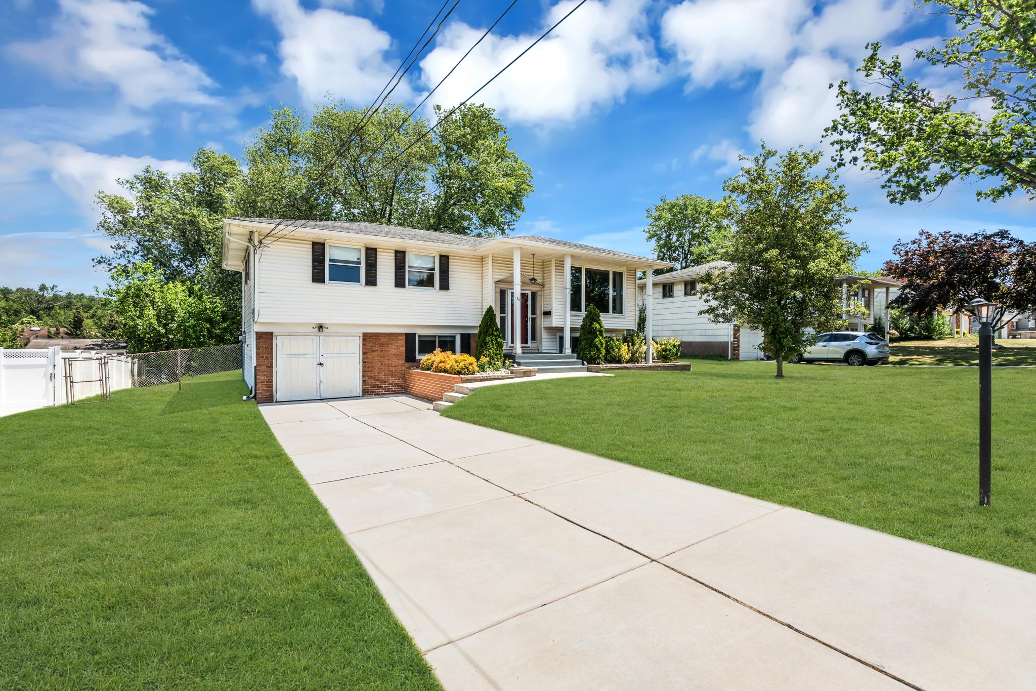 34 Haines Mill Road Delran, NJ 08075 - Photo 33 of 34 Charming home with lush green lawn.