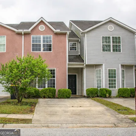 a view of outdoor space yard and front view of a house