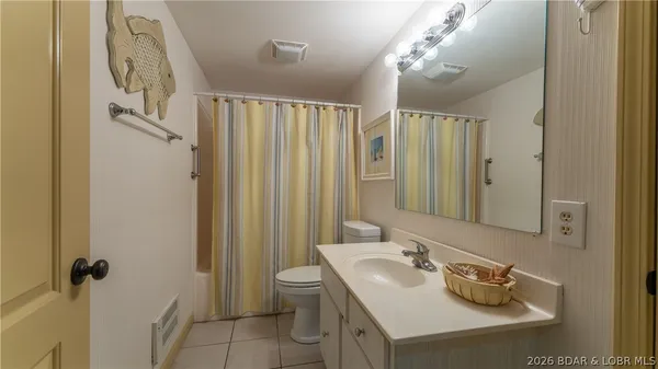 $295,000 | 98 Bent Shadow Lane, Osage Beach, MO 65065