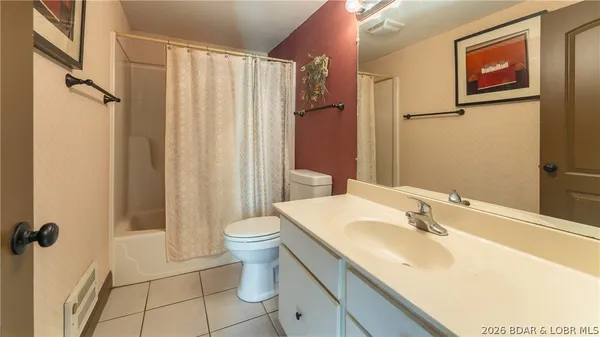 $295,000 | 98 Bent Shadow Lane, Osage Beach, MO 65065