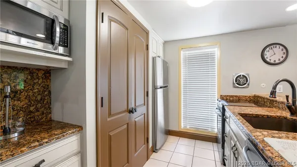 $295,000 | 98 Bent Shadow Lane, Osage Beach, MO 65065