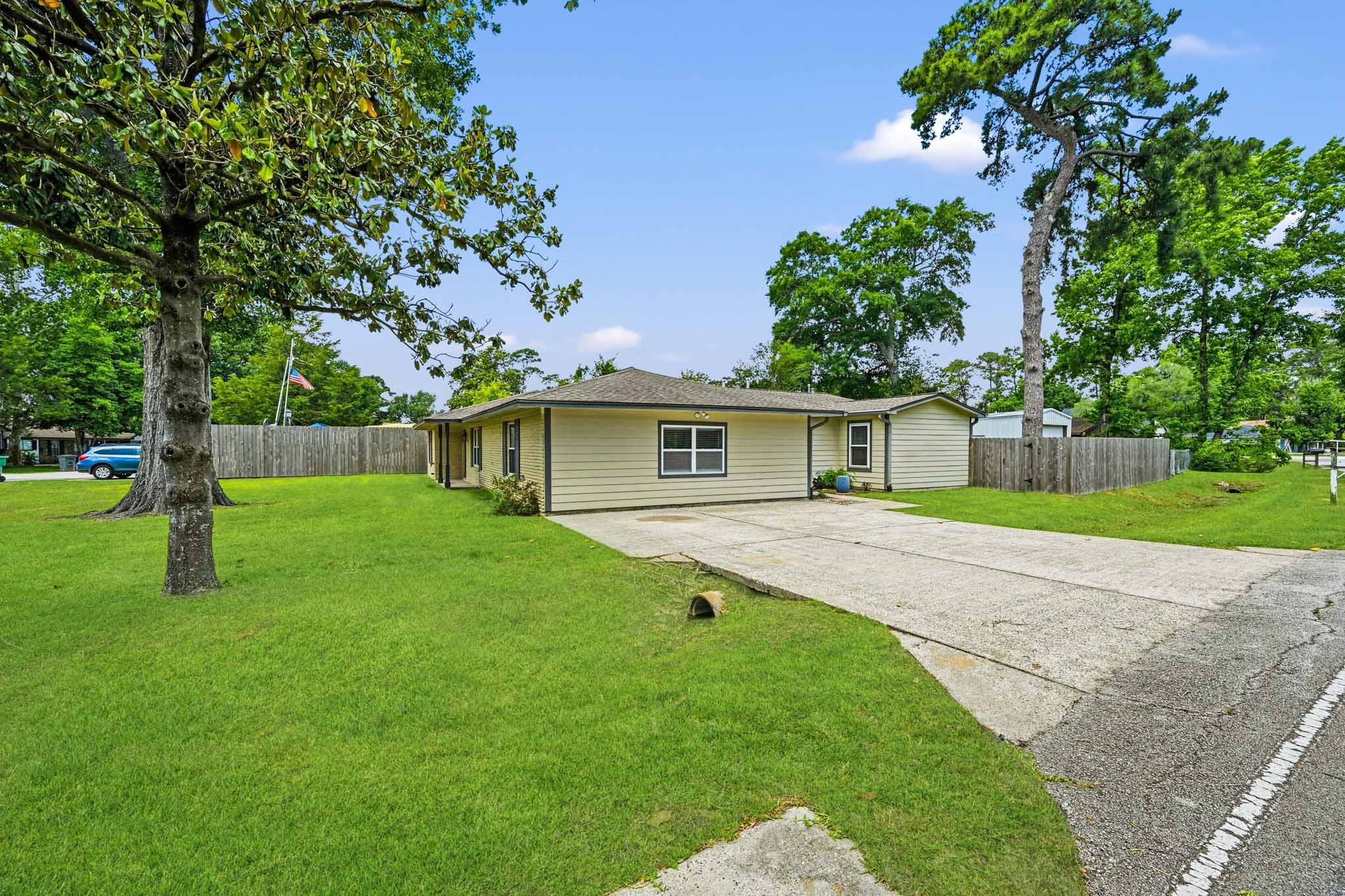 3602 Sweet Gum Spring, TX 77388 - Photo 2 of 30 a front view of a house with a yard