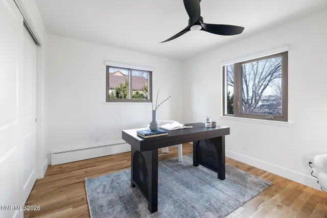 a view of a wooden deck and a yard