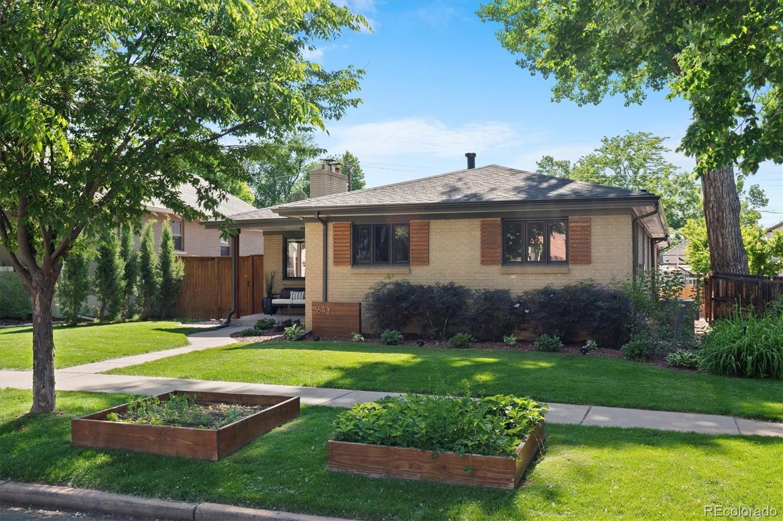 1643 South Ogden Street Denver, CO 80210 - Photo 2 of 39 a view of a house with backyard