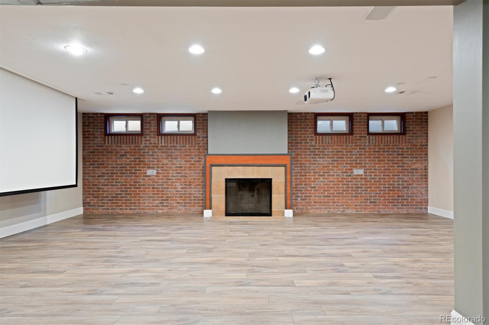 1643 South Ogden Street Denver, CO 80210 - Photo 29 of 39 a view of a livingroom and a fireplace in a room