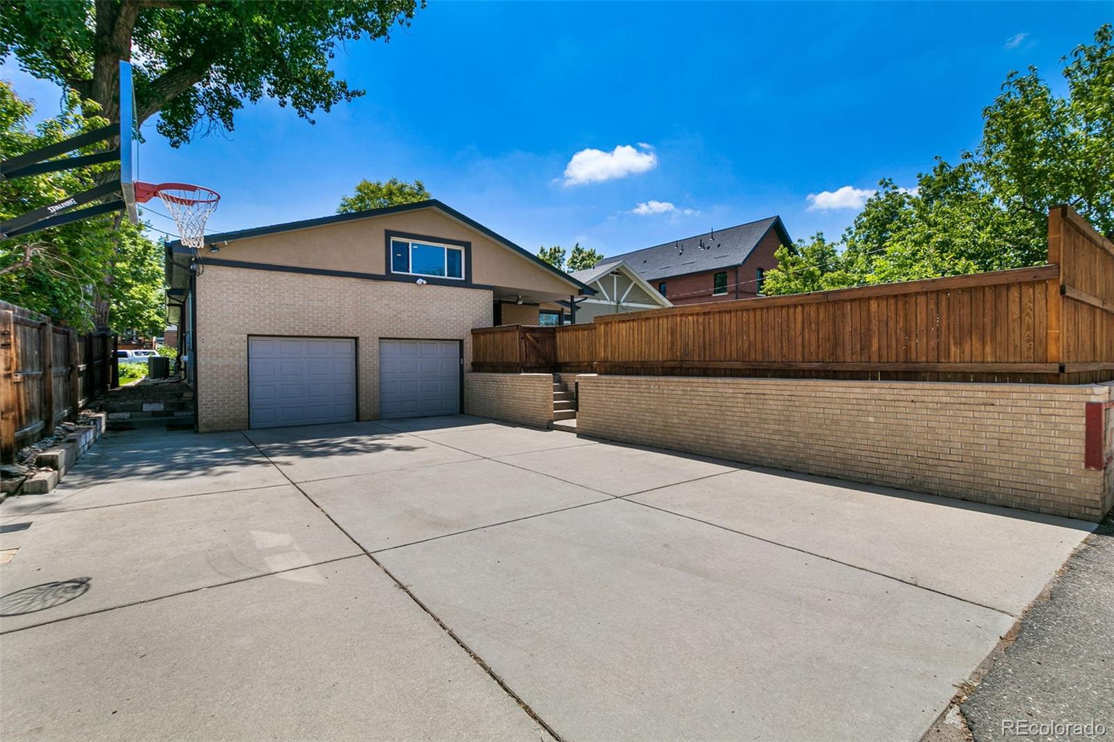 1643 South Ogden Street Denver, CO 80210 - Photo 35 of 39 a backyard of a house
