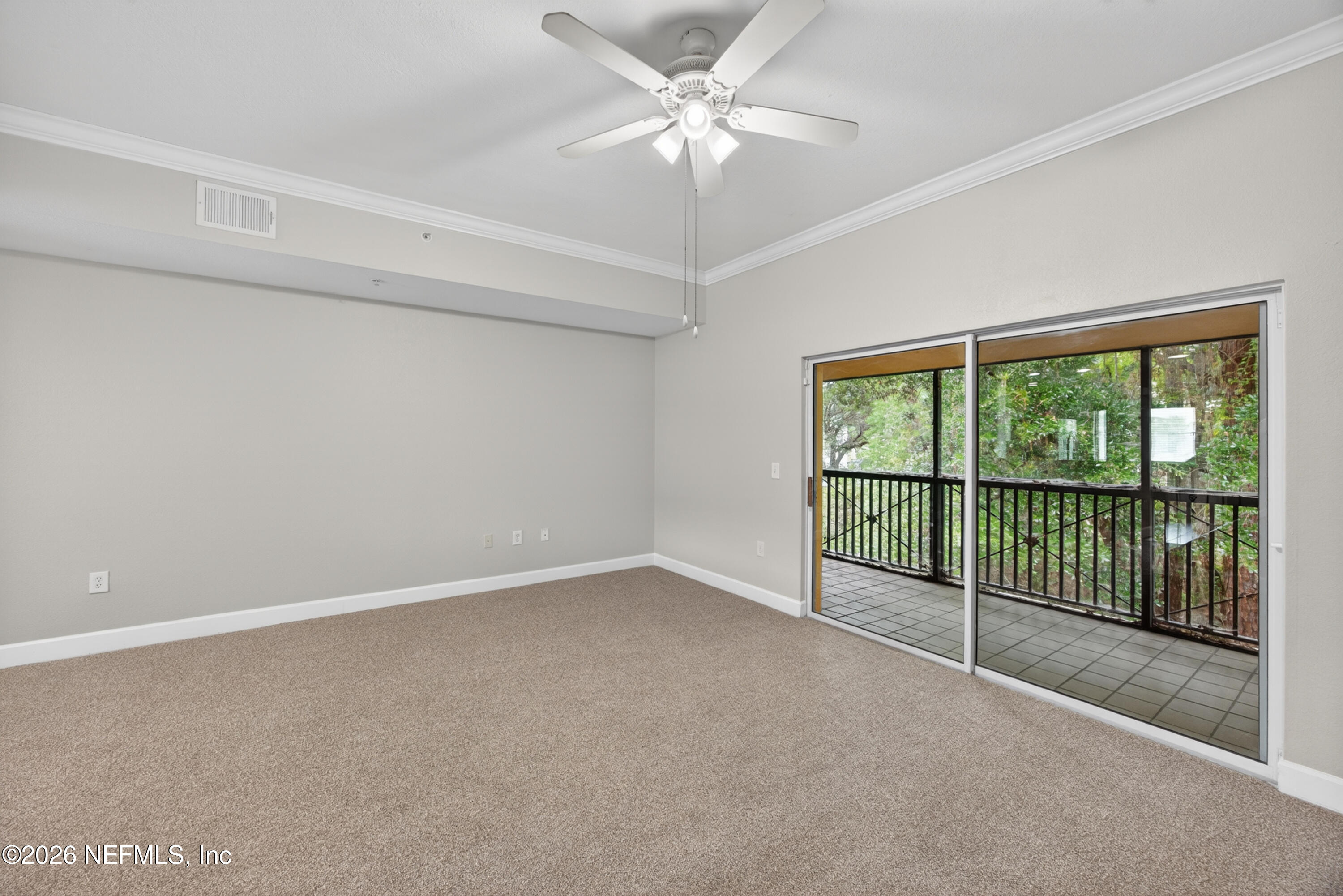 9745 Touchton Road, Unit 1224 Jacksonville, FL 32246 - Photo 10 of 22 a view of an empty room with a window