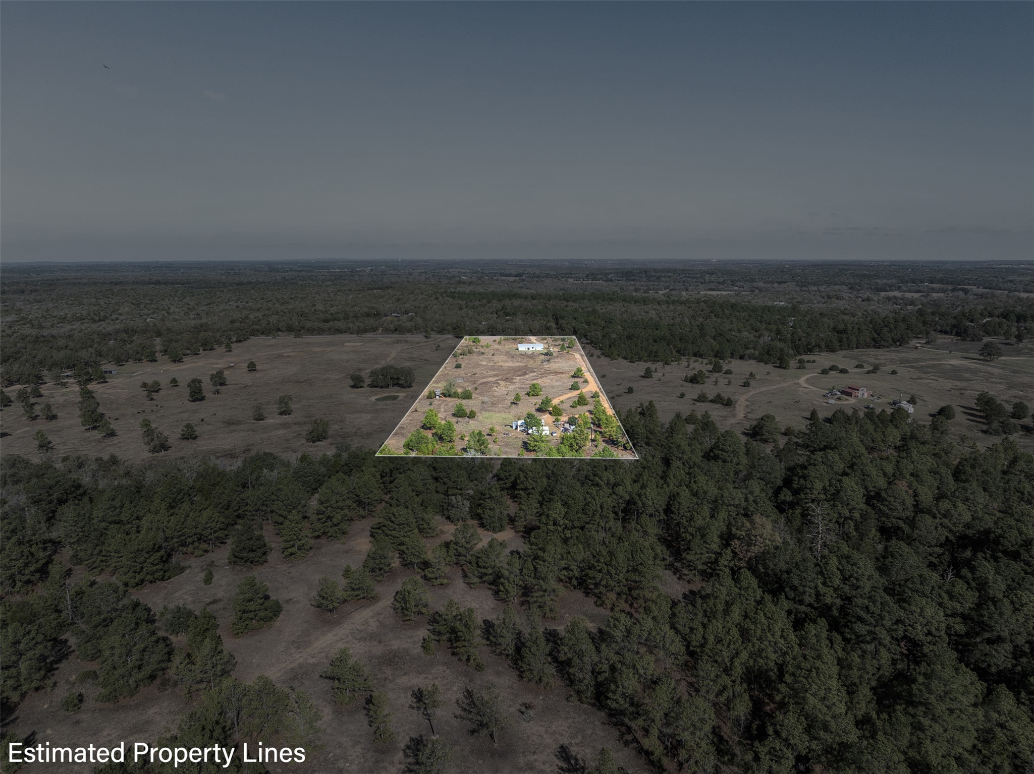 1759 Gotier Trace Road Paige, TX 78659 - Photo 35 of 40 a view of a dry yard with wooden floor and fence