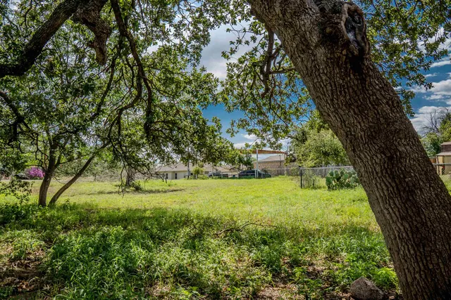 a view of outdoor space with deck and yard