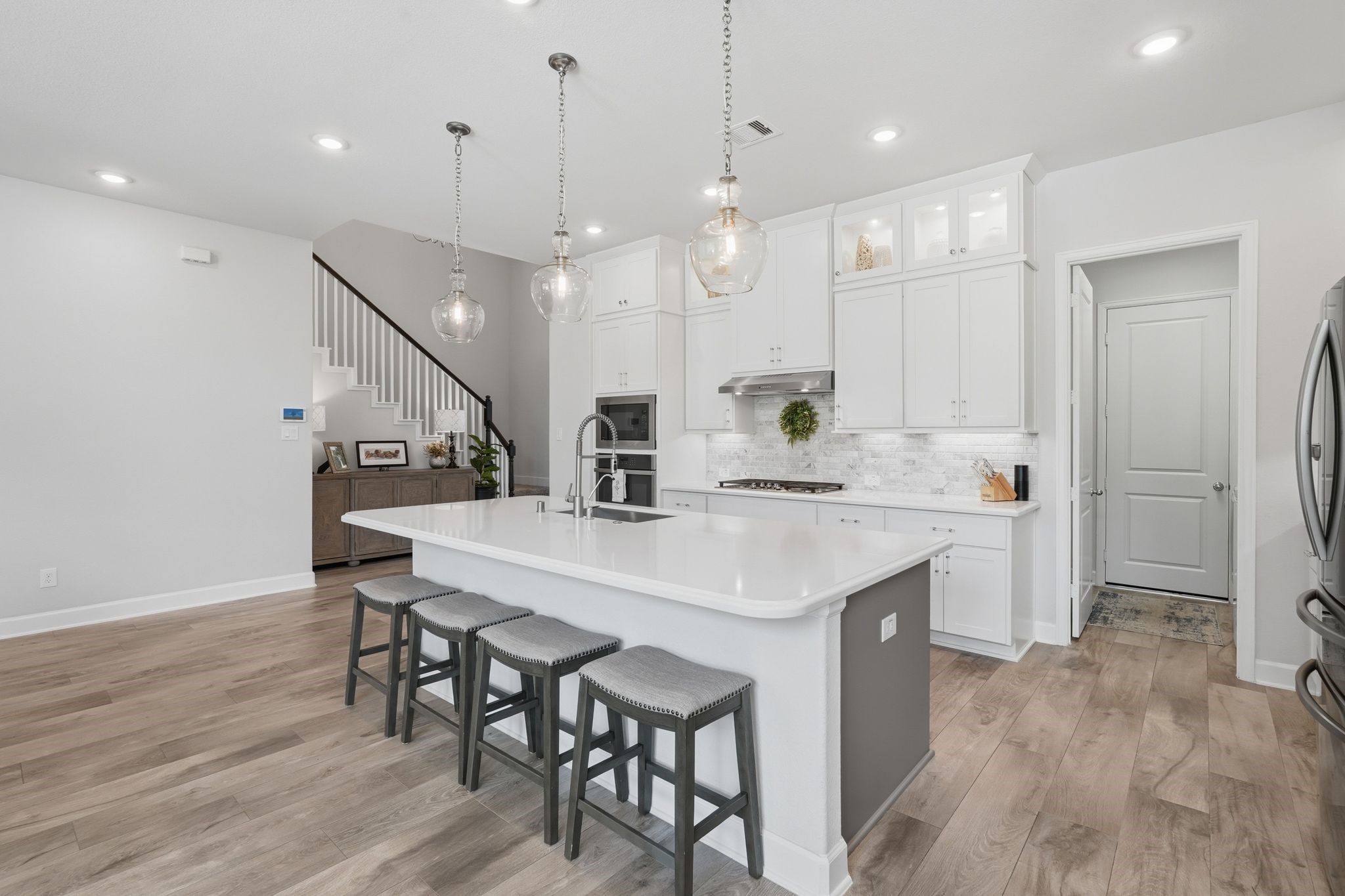 25011 Oxbow Lake Lane Spring, TX 77389 - Photo 12 of 33 a large kitchen with a table and chairs