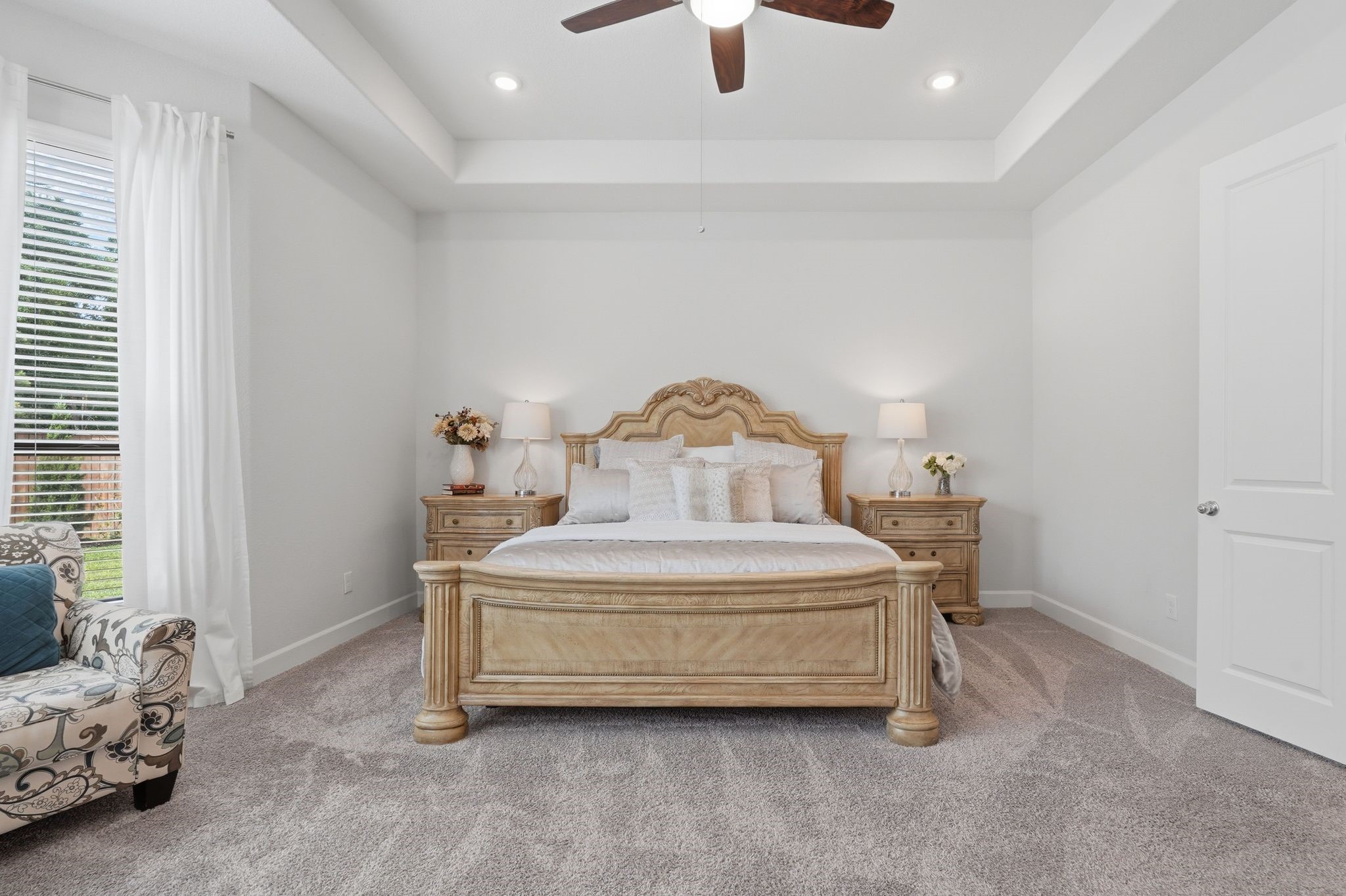 25011 Oxbow Lake Lane Spring, TX 77389 - Photo 20 of 33 a spacious bedroom with a bed and a window