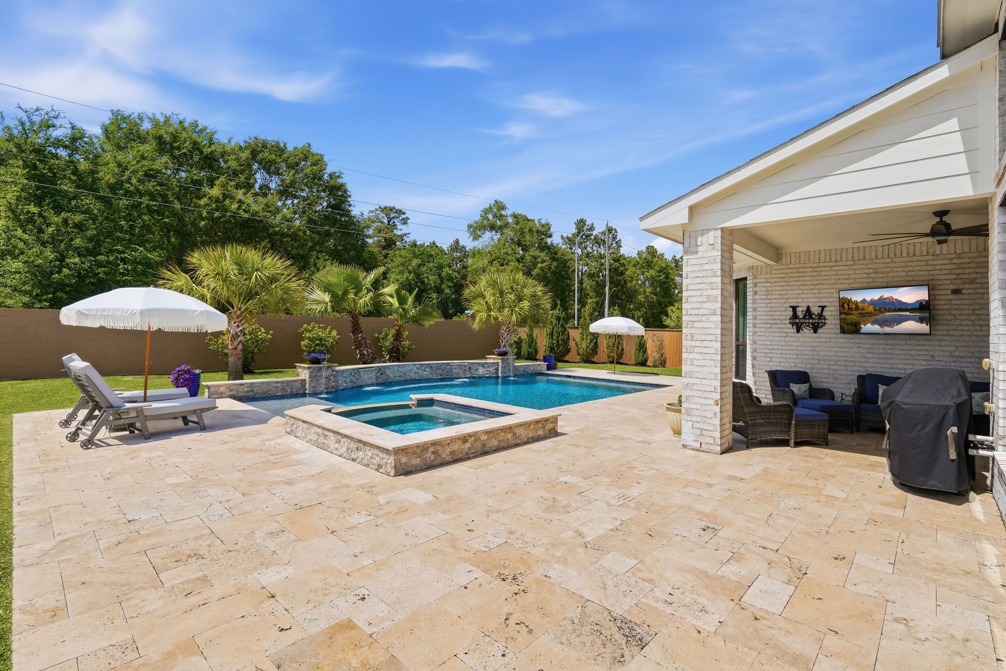 25011 Oxbow Lake Lane Spring, TX 77389 - Photo 25 of 33 a view of a terrace with chairs and potted plants
