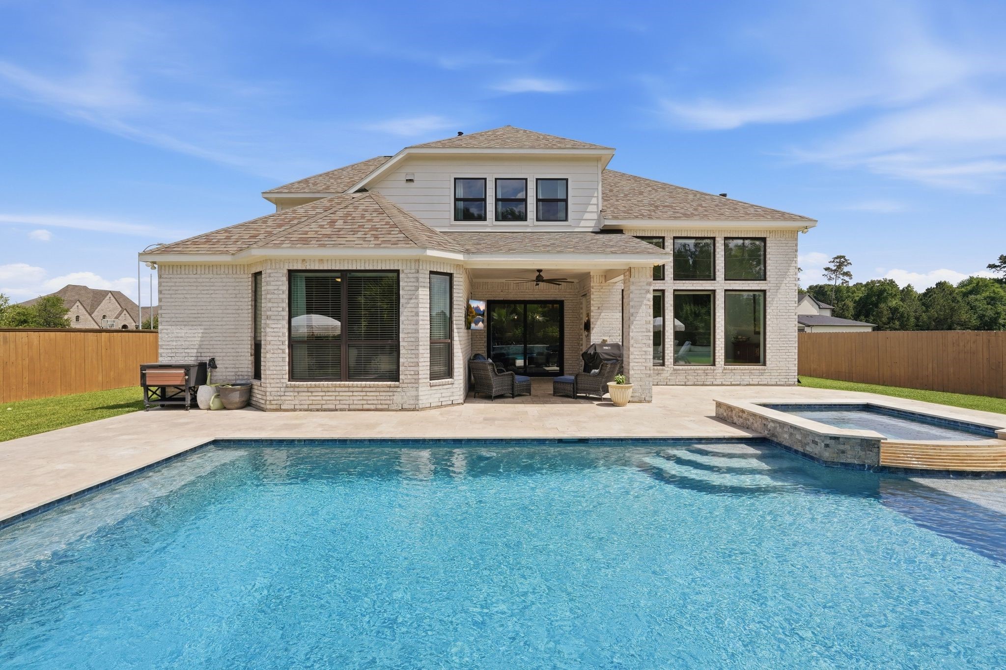 25011 Oxbow Lake Lane Spring, TX 77389 - Photo 28 of 33 a view of a house with swimming pool and porch