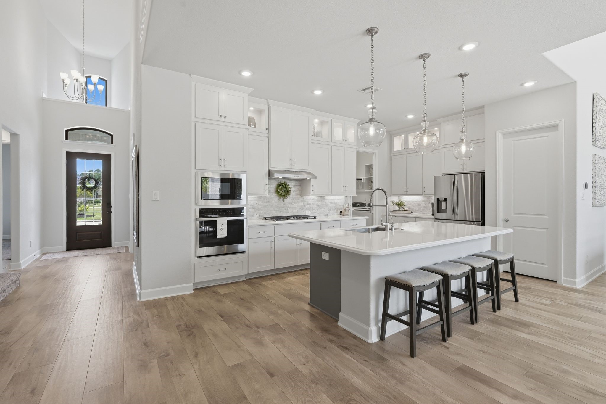 25011 Oxbow Lake Lane Spring, TX 77389 - Photo 10 of 33 a large kitchen with a table and chairs