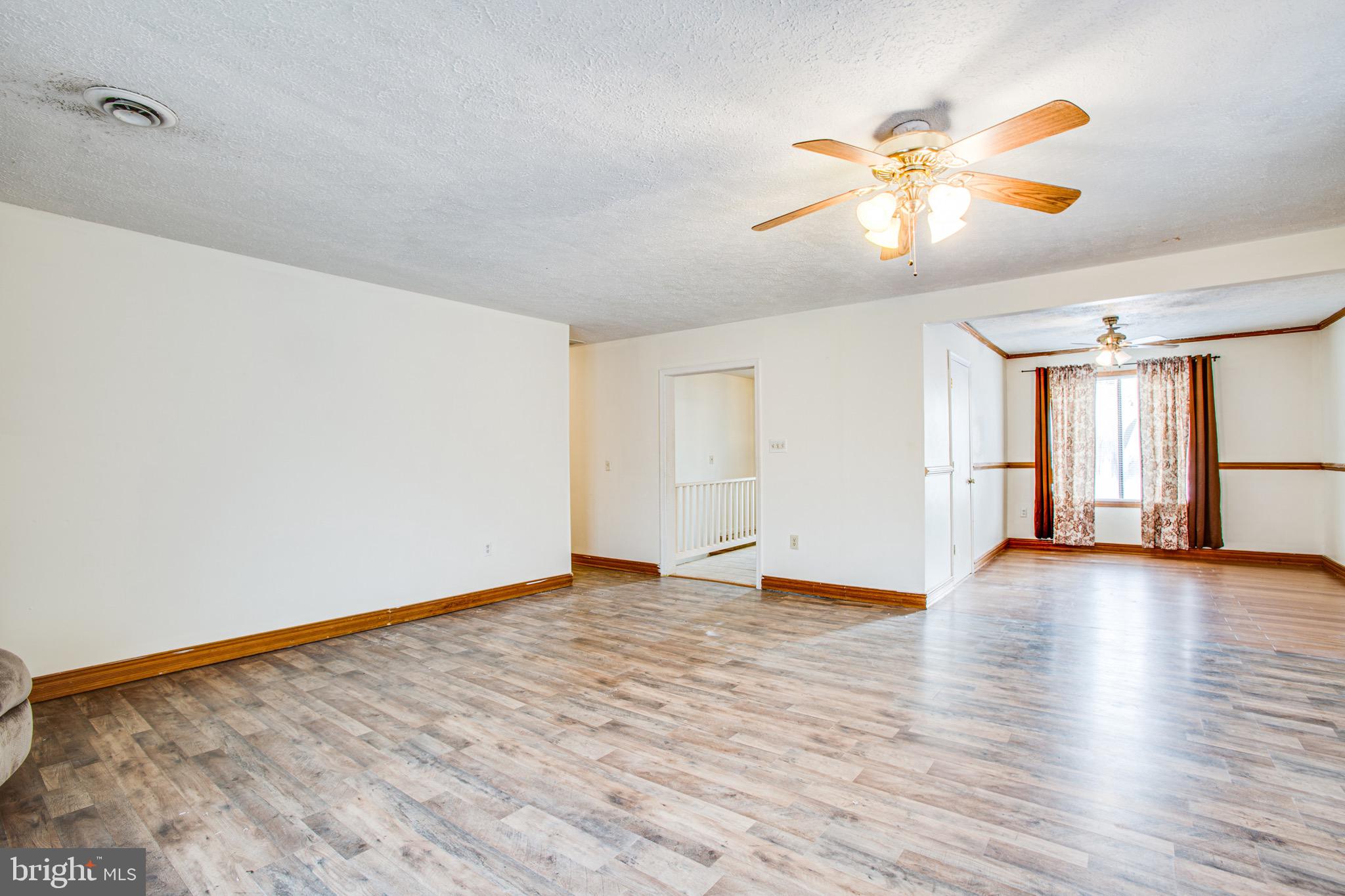 4000 Shepherds Road Partlow, VA 22534 - Photo 7 of 52 Family room leads to dining room