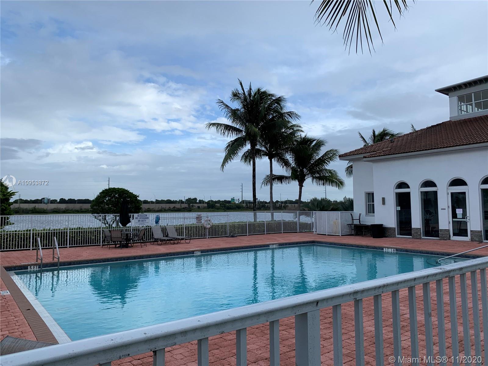 3915 Southwest 155th Avenue, Unit 313 Miramar, FL 33027 - Photo 10 of 10 a view of a lake with a ocean view