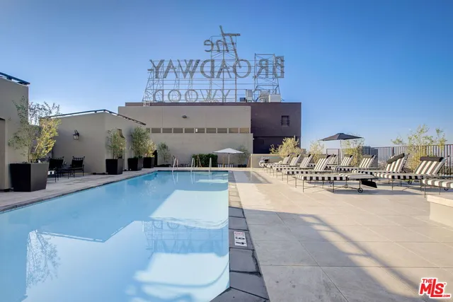 a view of a swimming pool and outdoor space