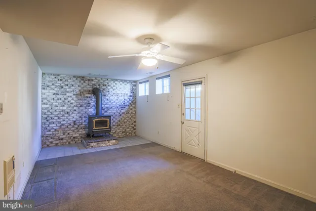 a view of a livingroom with a fireplace