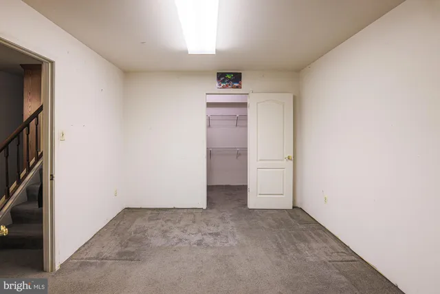 a view of a room with racks on the wall