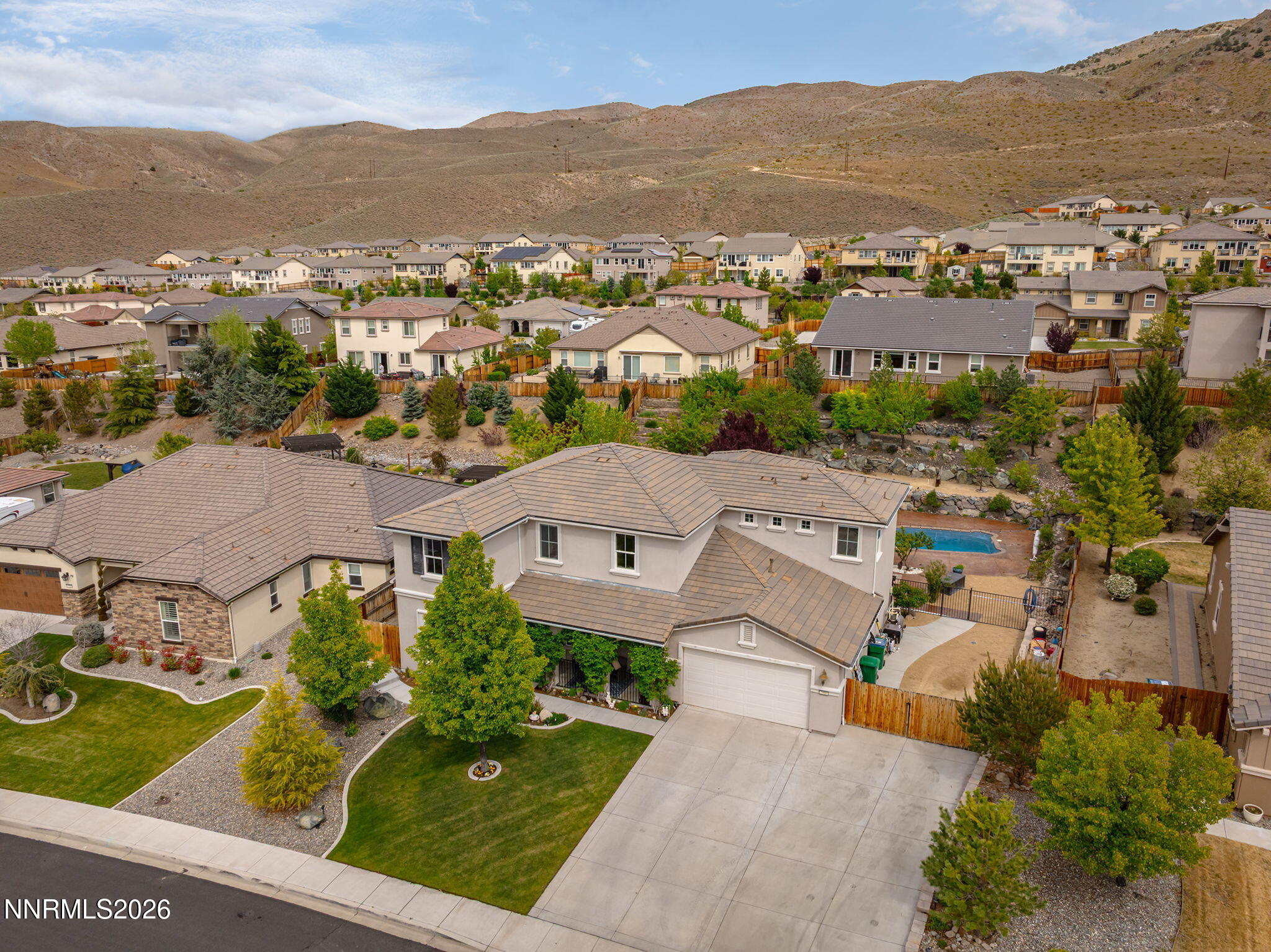 2960 Tobiano Drive Reno, NV 89521 - Photo 12 of 77 an aerial view of a house with a mountain