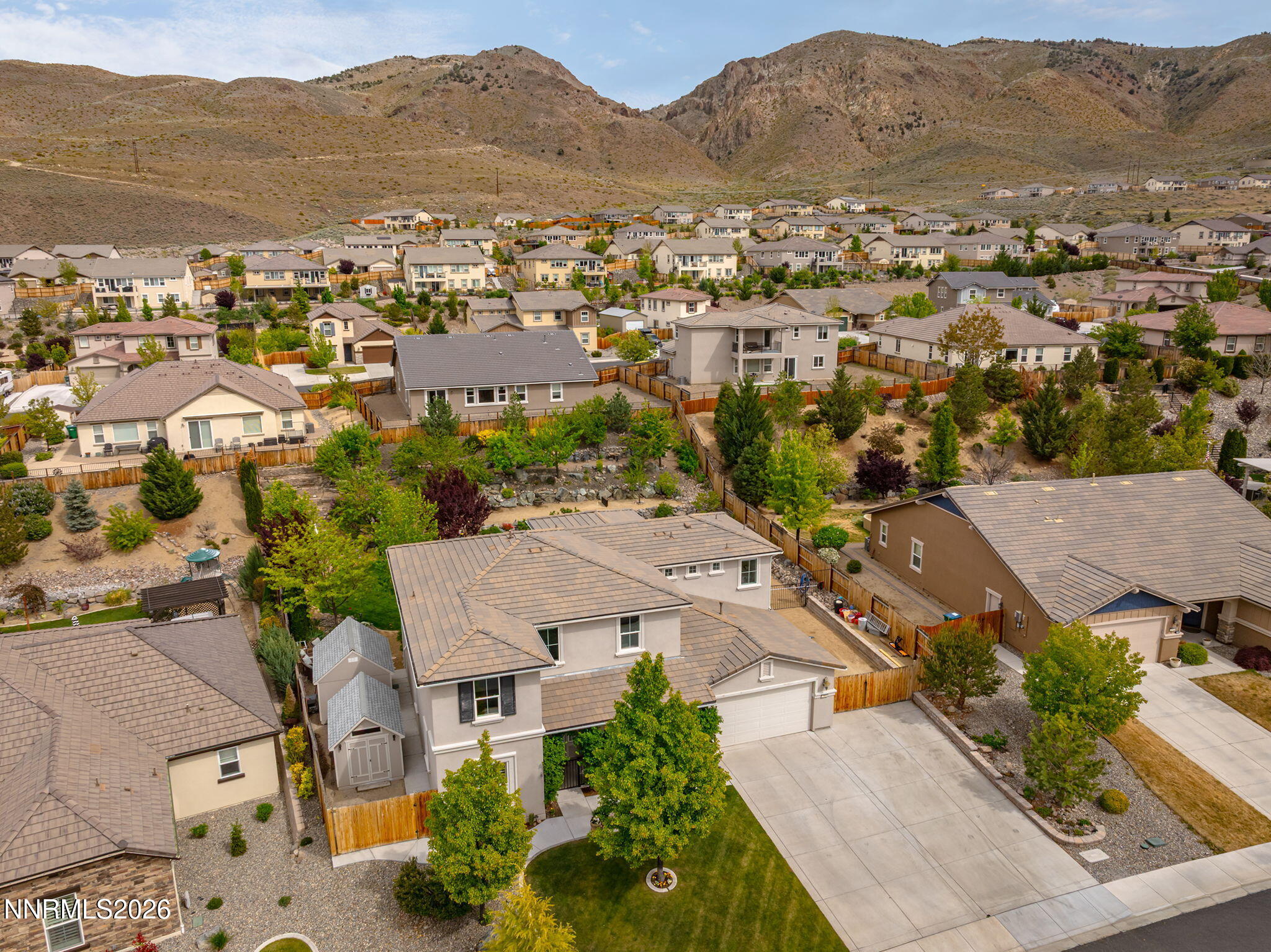 2960 Tobiano Drive Reno, NV 89521 - Photo 14 of 77 an aerial view of residential houses and outdoor space