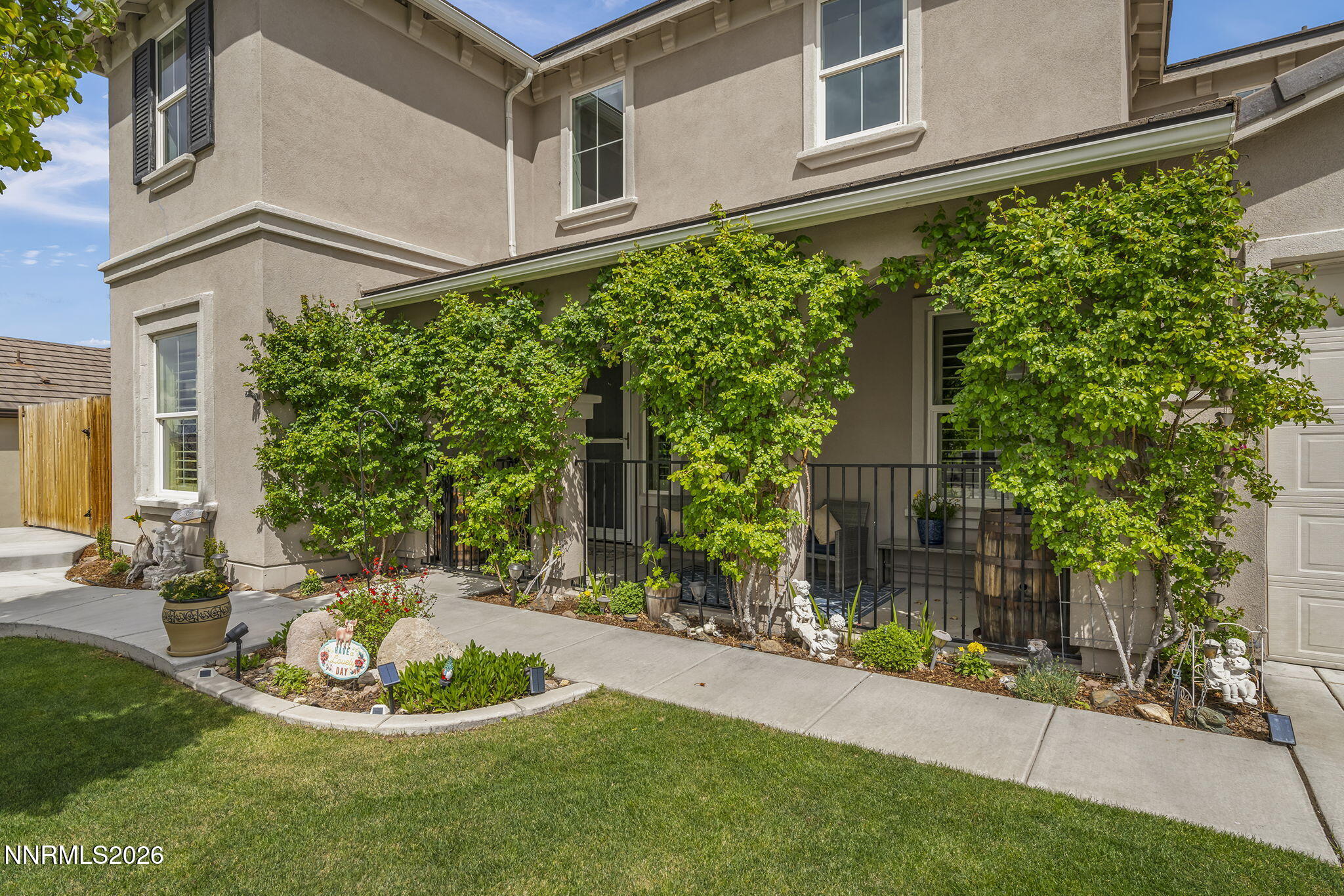 2960 Tobiano Drive Reno, NV 89521 - Photo 15 of 77 a front view of a house with a yard