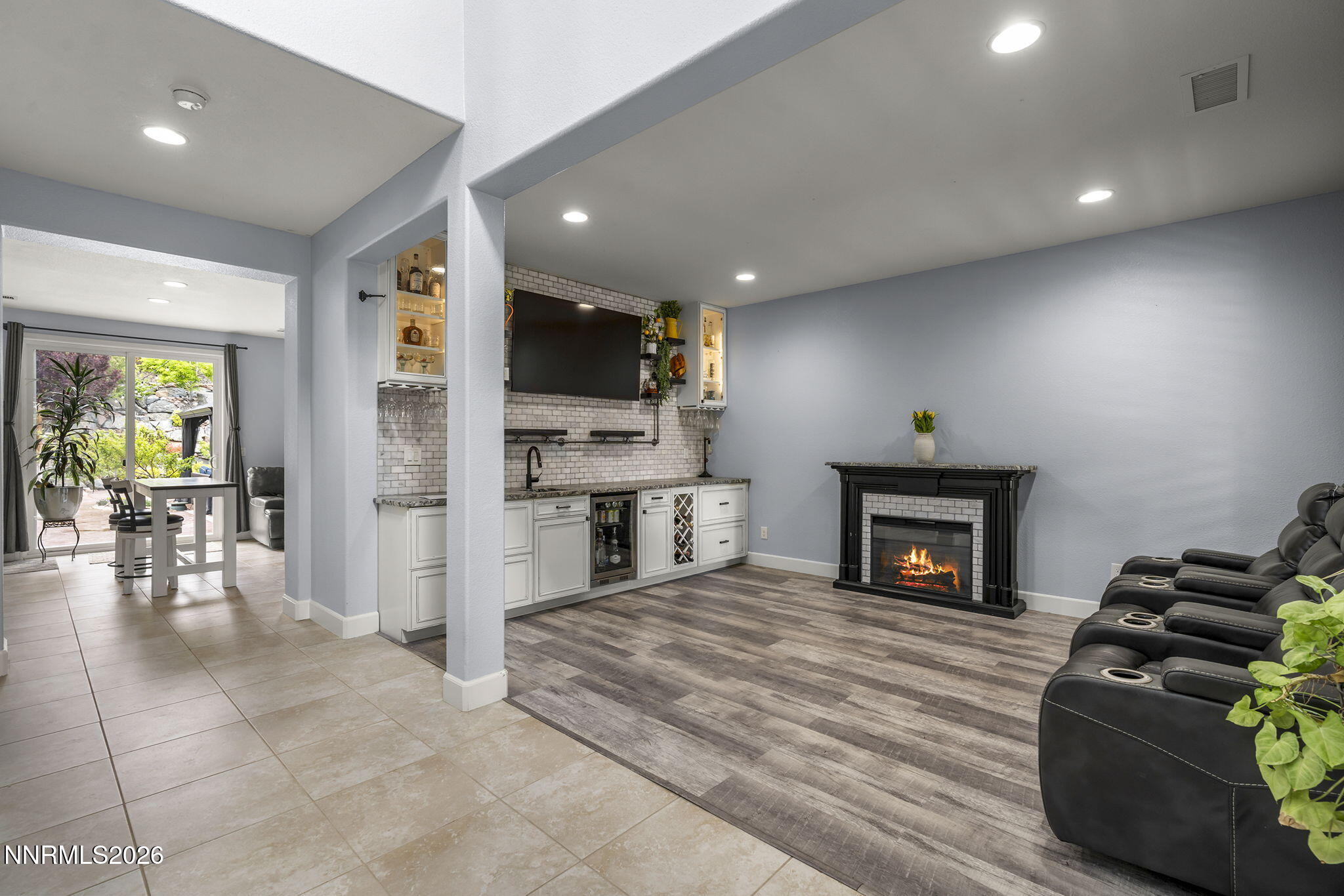 2960 Tobiano Drive Reno, NV 89521 - Photo 17 of 77 a living room with furniture and a fireplace
