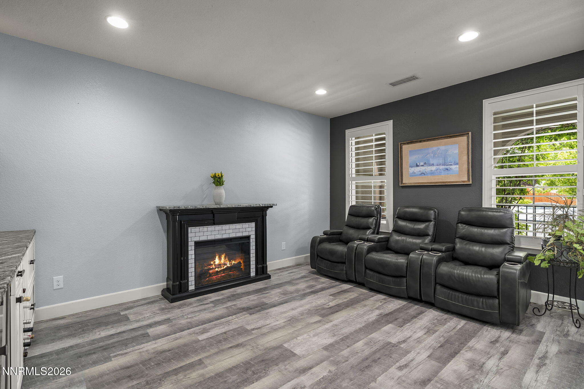 2960 Tobiano Drive Reno, NV 89521 - Photo 18 of 77 a living room with furniture and a fireplace