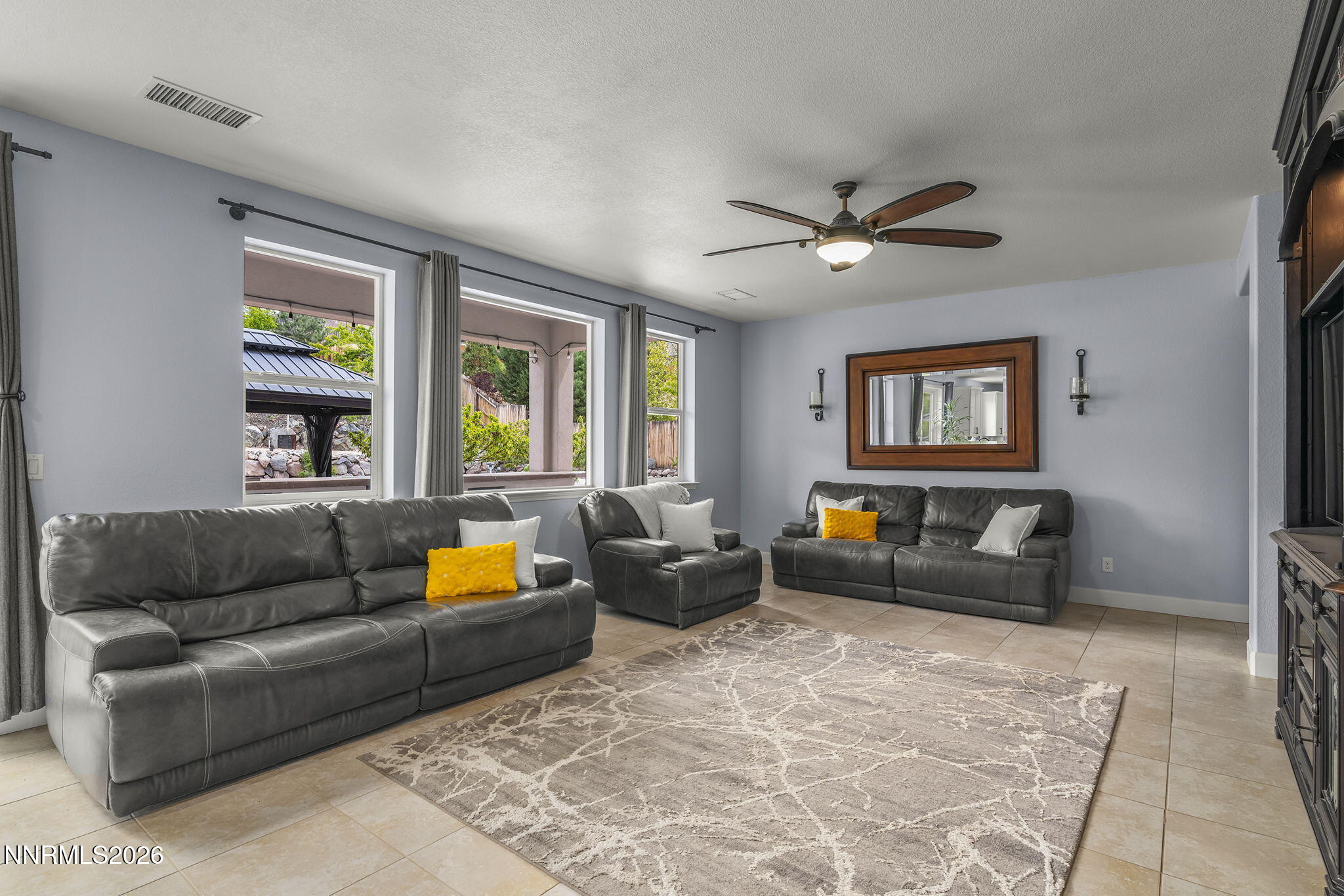 2960 Tobiano Drive Reno, NV 89521 - Photo 20 of 77 a living room with furniture and a large window