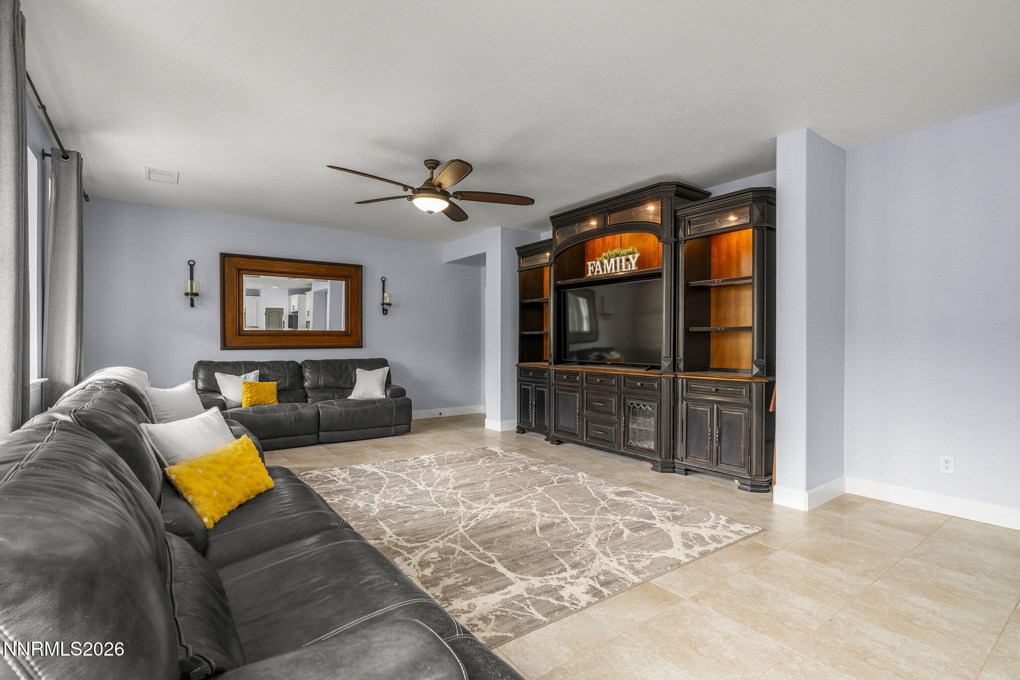 2960 Tobiano Drive Reno, NV 89521 - Photo 21 of 77 a living room with furniture and a flat screen tv