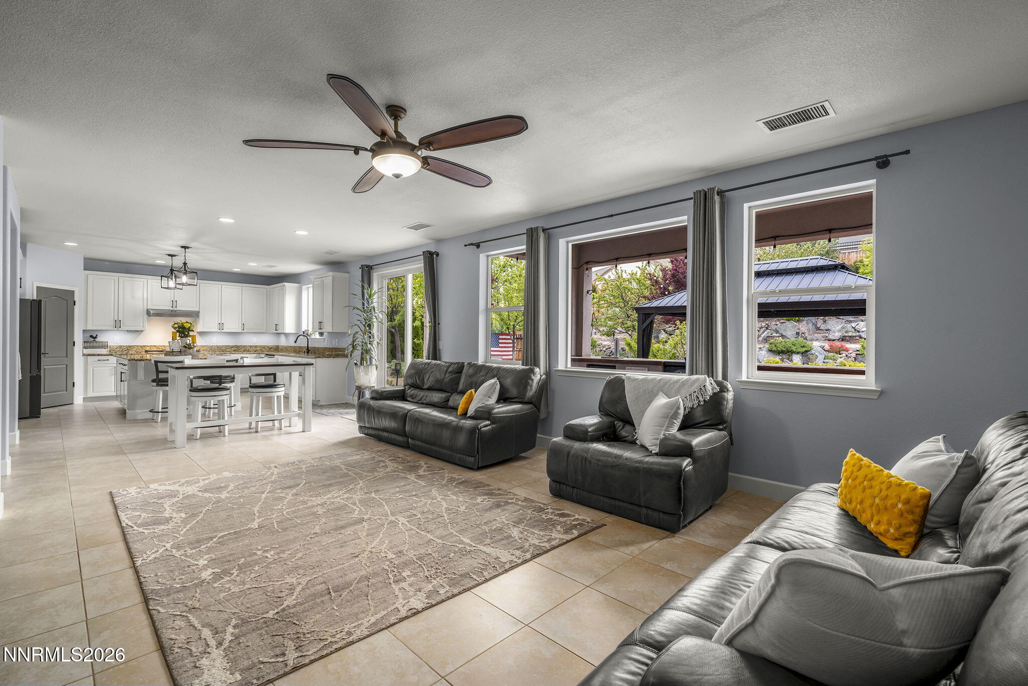 2960 Tobiano Drive Reno, NV 89521 - Photo 22 of 77 a living room with furniture and a window