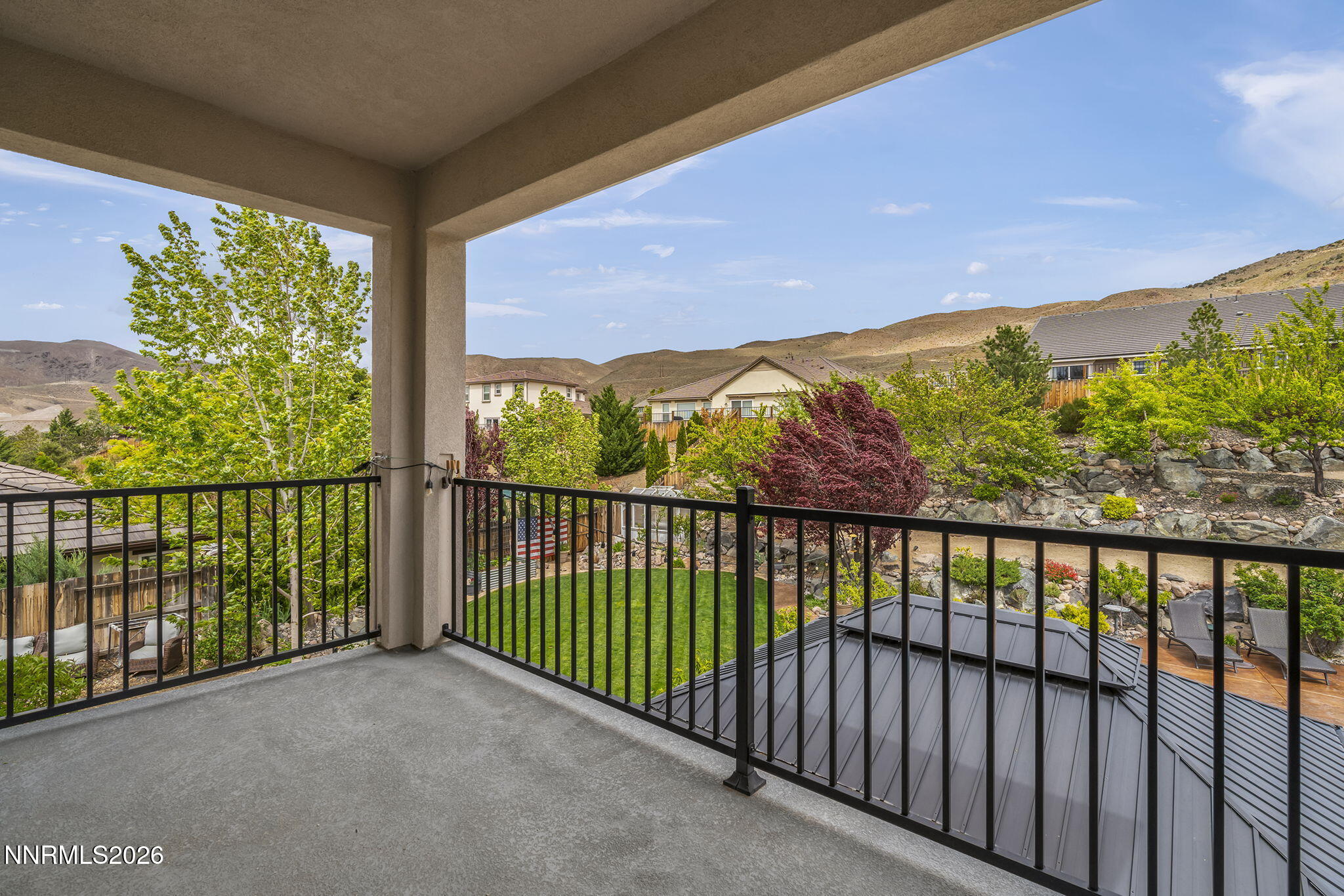 2960 Tobiano Drive Reno, NV 89521 - Photo 30 of 77 a view of a city skyline from a balcony