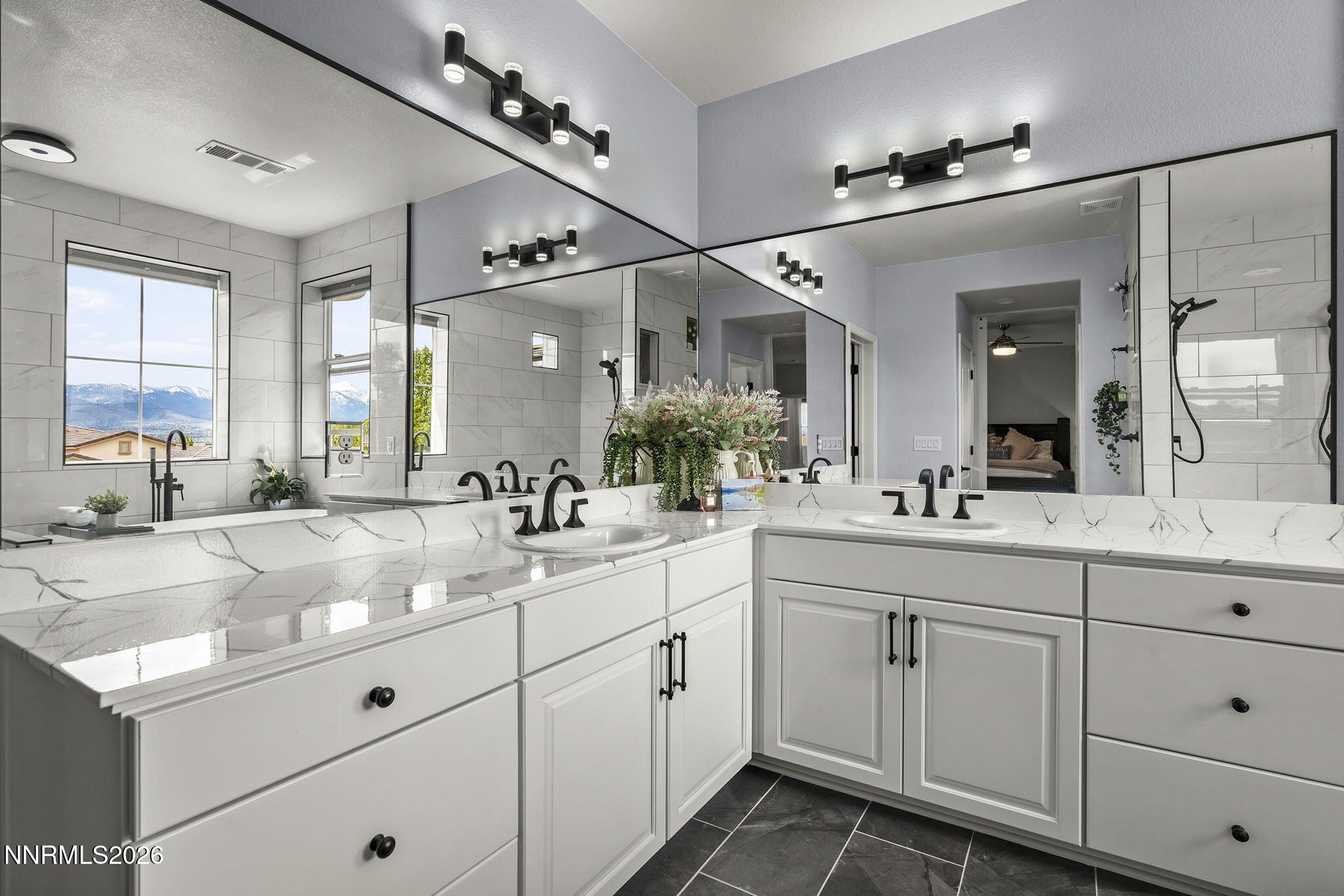 2960 Tobiano Drive Reno, NV 89521 - Photo 31 of 77 a bathroom with a granite countertop sink mirror and double