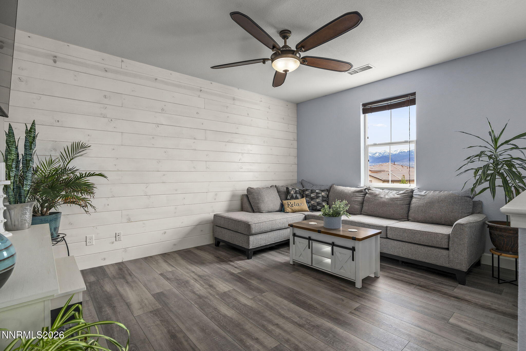 2960 Tobiano Drive Reno, NV 89521 - Photo 34 of 77 a living room with furniture and a large window