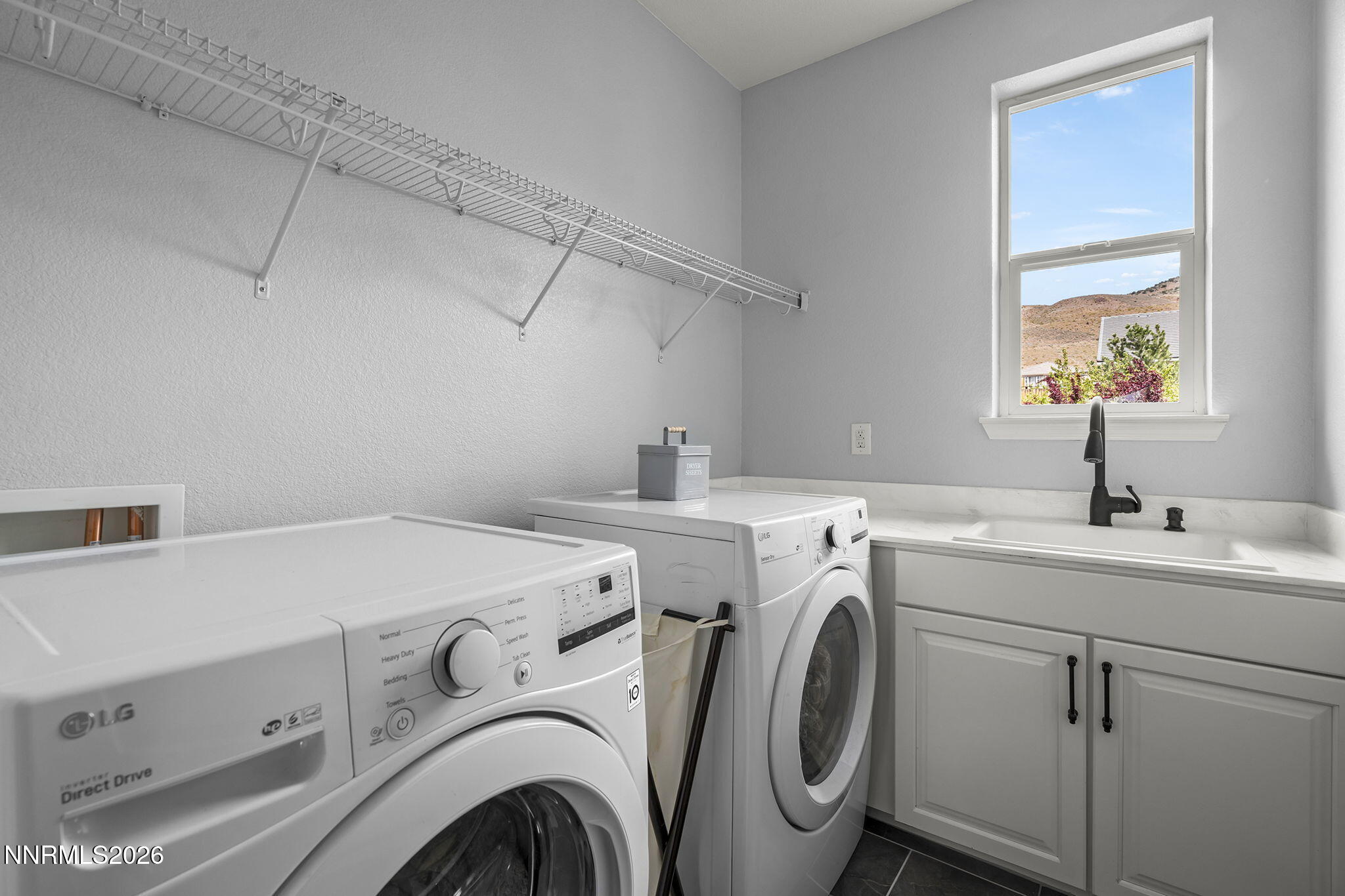 2960 Tobiano Drive Reno, NV 89521 - Photo 38 of 77 a utility room with dryer and washer
