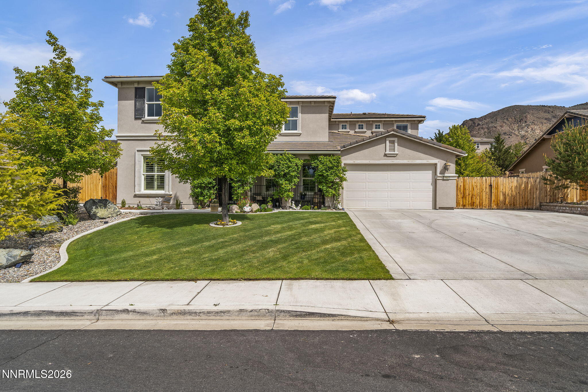 2960 Tobiano Drive Reno, NV 89521 - Photo 9 of 77 a view of a house with a yard