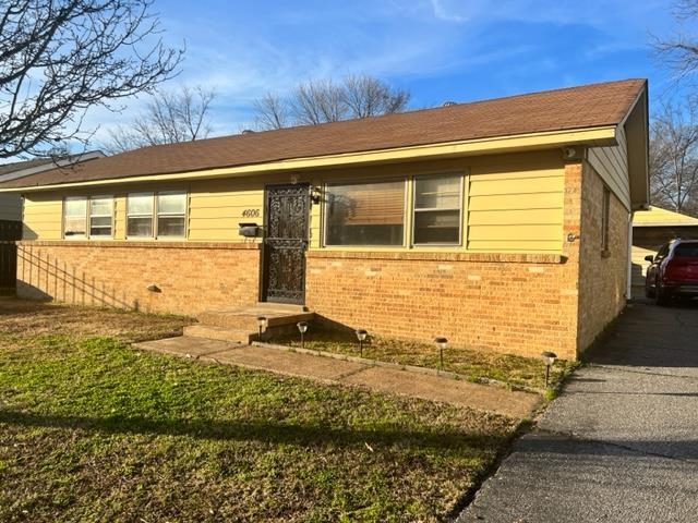 4606 Macon Road Memphis, TN 38122 - Photo 1 of 12 a view of a house with many windows