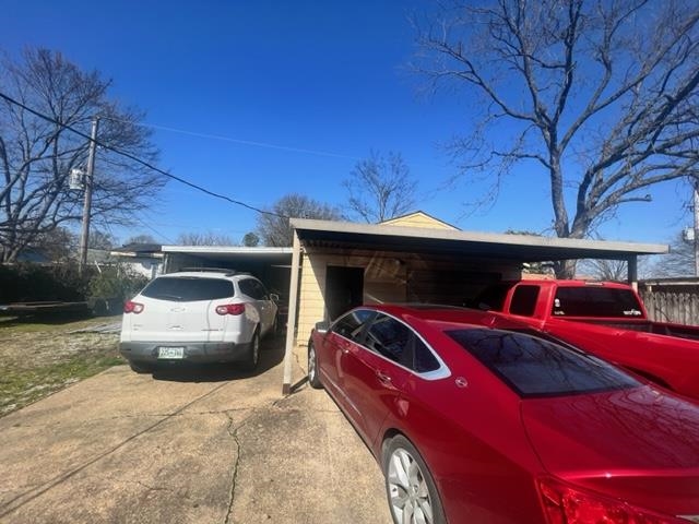 4606 Macon Road Memphis, TN 38122 - Photo 5 of 12 a front view of a house with parking space